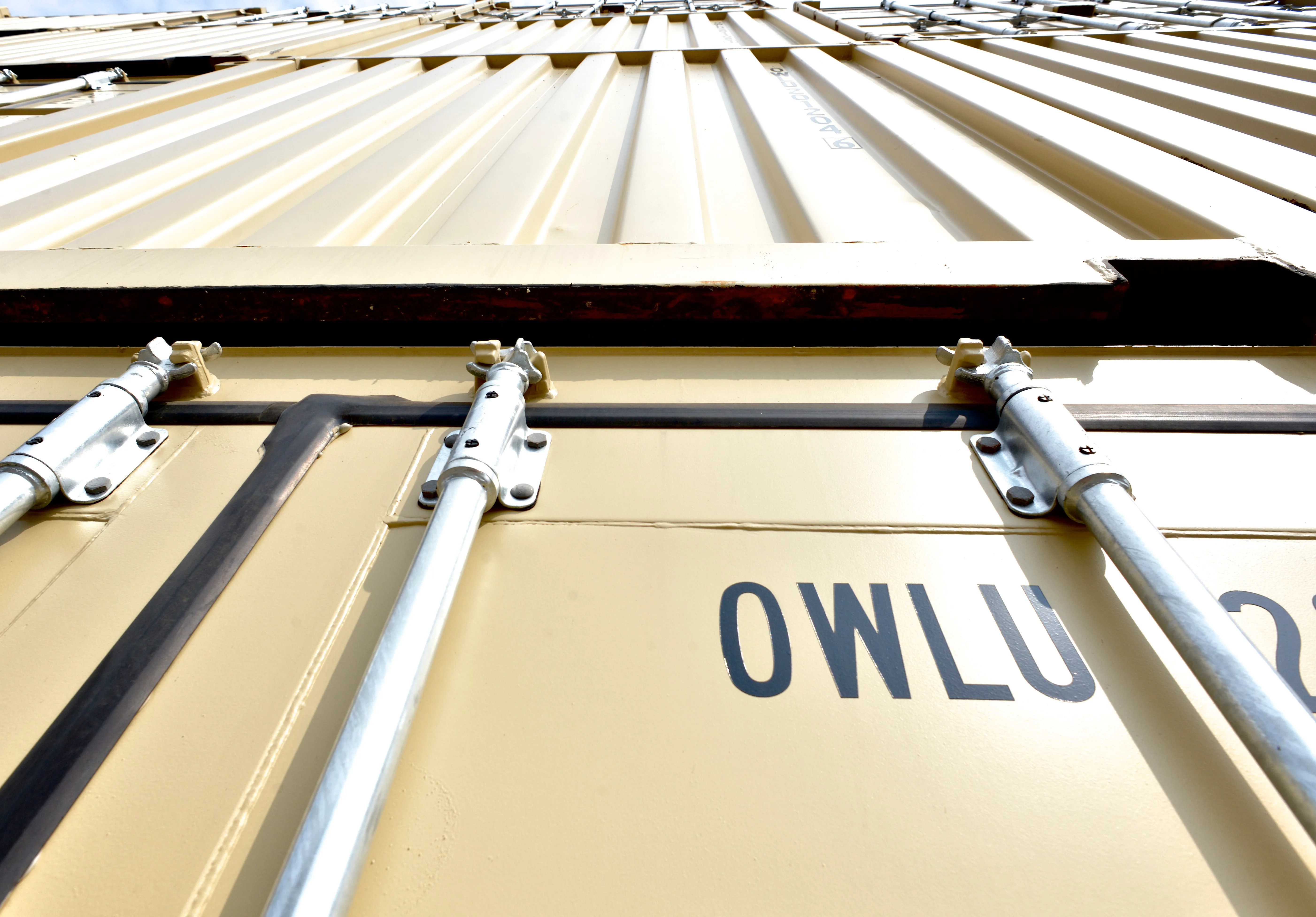 OWLU stencil on the door of a One Way Lease container