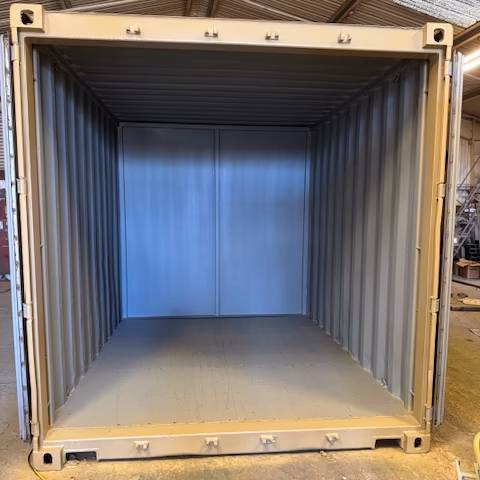 Primed Interior of a Refurbished Shipping Container